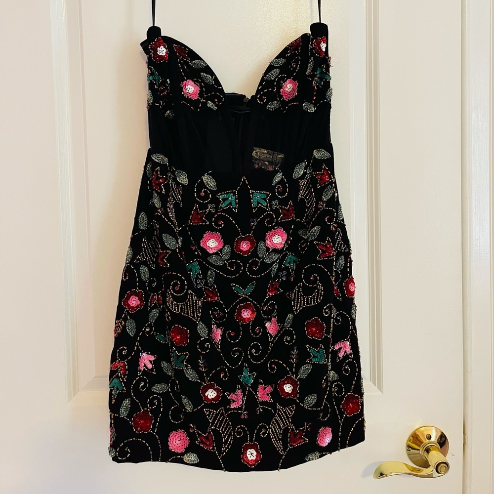 size small, original tags . Strapless and v cut